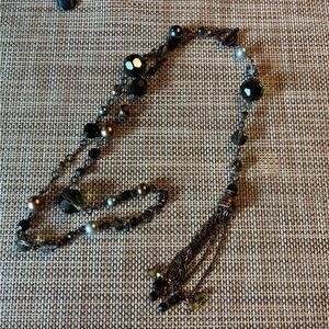 Chic Black and Gold Beaded Necklace with detachable tassel.
